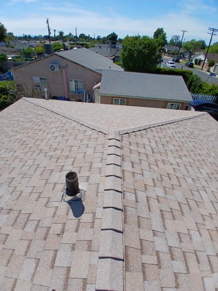 Slide of Reliance Roofing