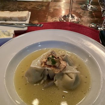 Rioja - artichoke tortelloni  |  artichoke mousse, white truffle brodo, aged Manchego, chervil.  Perfectly light but filling & soooo satisfying. - New American Near Me - Denver, Colorado