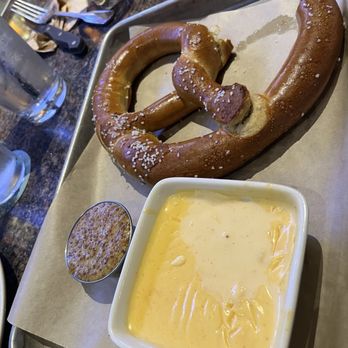BJ's Restaurant & Brewhouse - Big Twist Pretzel With Beer Cheese - Pizza Near Me - Peoria, Arizona BJ's Restaurant & Brewhouse - Big Twist Pretzel With Beer Cheese - Pizza Near Me - Peoria, Arizona