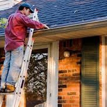 Life-Skills Empowerment Group - a man on a ladder working on a house - General Contractors Near Me