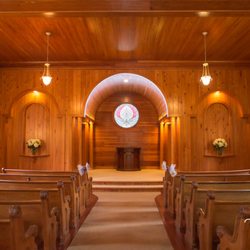Tavern In the Garden - Inside the chapel. The wood paneling gives everything a very dark yet warm feeling
