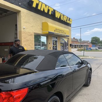 Tint World - "Spot Painting" repair to cloth top due to damage from solvent cleaner...owner's son said, "it looks great"...you make the call... - Car Stereo Installation Near Me - Bensenville, Illinois