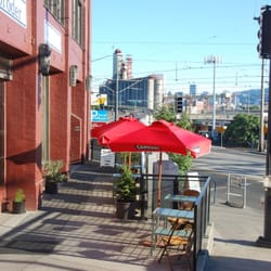 Metro Computerworks - Metro Computerworks LLC entrance past outdoor seating at Broder Nord