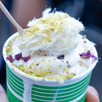 Queens Night Market - Syrian Booza, shown with Syrian Cotton, Pistachios, and Roses. From Hanina Sweets. $6. Get this. - Food Stands Near Me - Corona, New York Queens Night Market - Syrian Booza, shown with Syrian Cotton, Pistachios, and Roses. From Hanina Sweets. $6. Get this. - Food Stands Near Me - Corona, New York