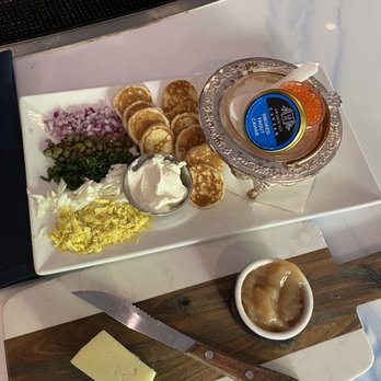 A'Bouzy - Caviar with all that jazz, manchego and jam - Champagne Bars Near Me - Houston, Texas A'Bouzy - Caviar with all that jazz, manchego and jam - Champagne Bars Near Me - Houston, Texas