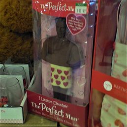 a teddy bear and a cupcake in a box