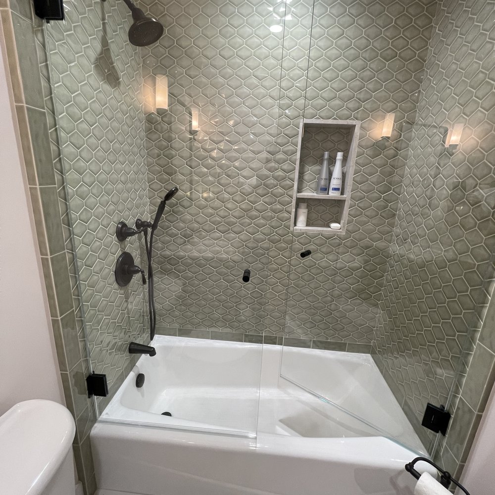 Design Miter Tile - Loved glass subcontractors recommendation of door knobs instead of pull. They also chose hinges that worked with the beveled tile. - Tiling Near Me - Campbell, California Design Miter Tile - Loved glass subcontractors recommendation of door knobs instead of pull. They also chose hinges that worked with the beveled tile. - Tiling Near Me - Campbell, California