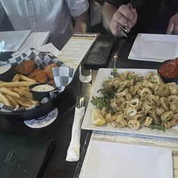Calamari, boneless wings and fries.