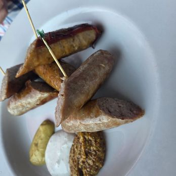 Tizley's Europub - Sausage sampler - German Near Me - Poulsbo, Washington Tizley's Europub - Sausage sampler - German Near Me - Poulsbo, Washington