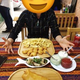Happy celiac with gluten free king prawns and chips and vice versa glutenfree cod with three different dips.