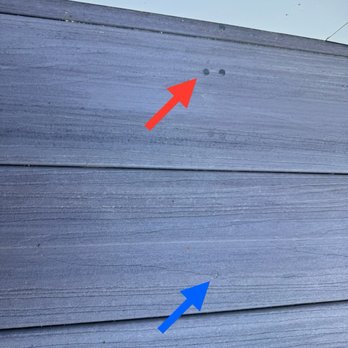 Guerrero Home Renovation Plus - Screw plugs that don't match (red arrow; likely leftovers from their last job) vs. screw plugs that match my panel (blue arrows). - General Contractors Near Me - Boston, Massachusetts