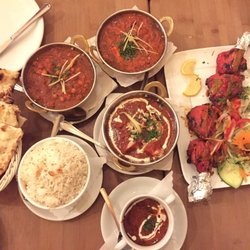 Little India - The spread including chicken tikka masala, tandoori chicken, chana masala, and a paneer dish