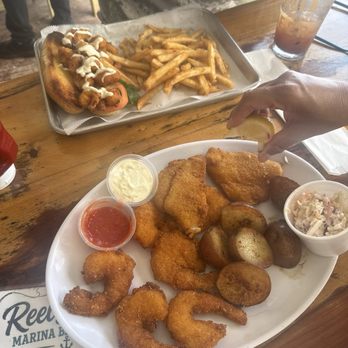 Reel Nauti - Fried fish and shrimp plate sub boiled potatoes, shrimp po boy with fries - Bars Near Me - Galveston, Texas Reel Nauti - Fried fish and shrimp plate sub boiled potatoes, shrimp po boy with fries - Bars Near Me - Galveston, Texas