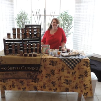 Olive Lucy - a woman standing behind a table with jars of jams on it - Herbs & Spices Near Me - Jenkintown, Pennsylvania Olive Lucy - a woman standing behind a table with jars of jams on it - Herbs & Spices Near Me - Jenkintown, Pennsylvania