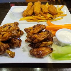 Alley Pond Sports Bar & Grill - Top: Fish & Chips
Bottom: Wings (half honey garlic/half spiced soy sauce)
