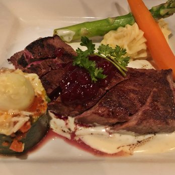 Le Chat Noir - La Nolsette D'Agneau du Chat Noir - Lamb loin in a lingonberry and gorgonzola sauce ($33.00) - French Near Me - Riverside, California Le Chat Noir - La Nolsette D'Agneau du Chat Noir - Lamb loin in a lingonberry and gorgonzola sauce ($33.00) - French Near Me - Riverside, California