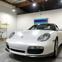Porsche wrapped in satin pearl white.