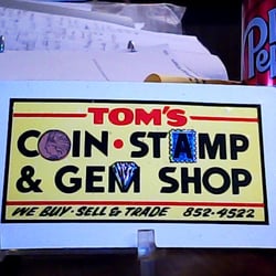 Tom's Coin Stamp Gem Baseball & Comic Shop