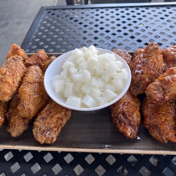 Bonchon Central Park - Medium half and half Wings with radishes - Korean Near Me - Denver, Colorado