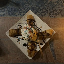 Fried banana with ice cream. Yum! Fried banana with ice cream. Yum!