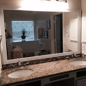 Creative Glass and Granite - a woman taking a picture of herself in the mirror - General Contractors Near Me - Spring, Texas Creative Glass and Granite - a woman taking a picture of herself in the mirror - General Contractors Near Me - Spring, Texas