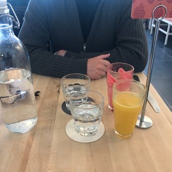 Pancake Social - Still water, water glasses, ginger lemon and aftermath of beet apple juice. - Pancakes Near Me - Atlanta, Georgia Pancake Social - Still water, water glasses, ginger lemon and aftermath of beet apple juice. - Pancakes Near Me - Atlanta, Georgia
