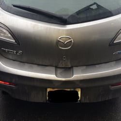 Burwell Carwash - The back of my car right out of the wash. Disgusting.