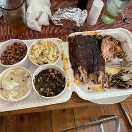 1/2 slab of ribs, 1/2 of chicken and 4 sides:black eyed peas, Mac &cheese, mashed potatoes and greens 1/2 slab of ribs, 1/2 of chicken and 4 sides:black eyed peas, Mac &cheese, mashed potatoes and greens