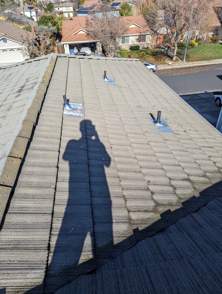 Slide of Total Package Roofing