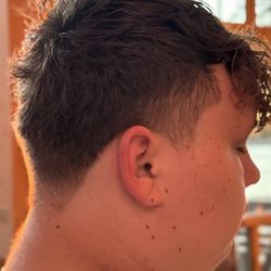 New Era Barber Studio - He butchered my son's head. Do NOT go to this barber shop! Absolutely horrible!