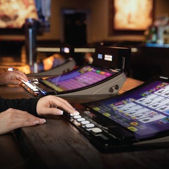 PT's Ranch - two people playing a casino game - Sports Bars Near Me - Las Vegas, Nevada PT's Ranch - two people playing a casino game - Sports Bars Near Me - Las Vegas, Nevada