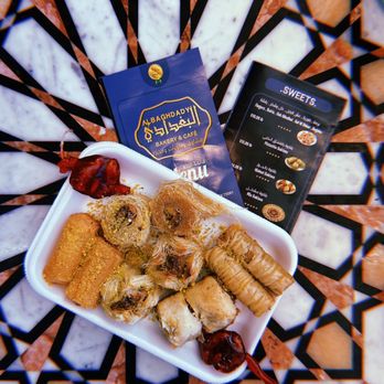 Albaghdady Restaurant & Bakery - a plate of food on a table - Bakeries Near Me - Richardson, Texas Albaghdady Restaurant & Bakery - a plate of food on a table - Bakeries Near Me - Richardson, Texas