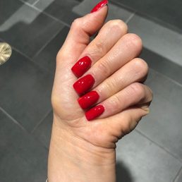 Red acrylic nails with shellac