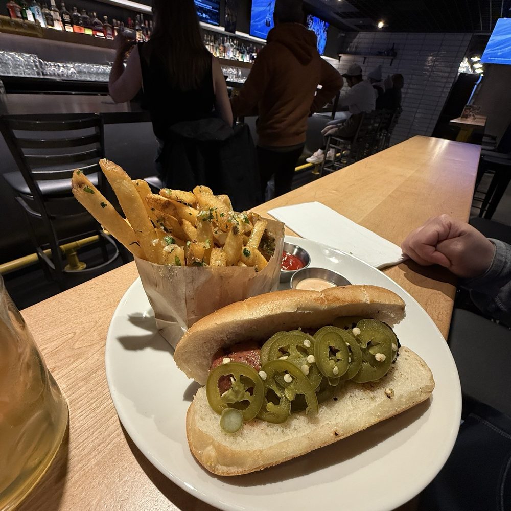 Gantry Public House - Vegan dog with garlic fries. Wife said there are amazing - New American Near Me - Seattle, Washington Gantry Public House - Vegan dog with garlic fries. Wife said there are amazing - New American Near Me - Seattle, Washington