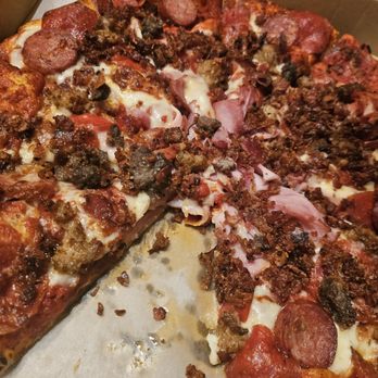 Flying Pie Pizzaria - My man's meaty pizza minus one slice ;) - Pizza Near Me - Nampa, Idaho Flying Pie Pizzaria - My man's meaty pizza minus one slice ;) - Pizza Near Me - Nampa, Idaho