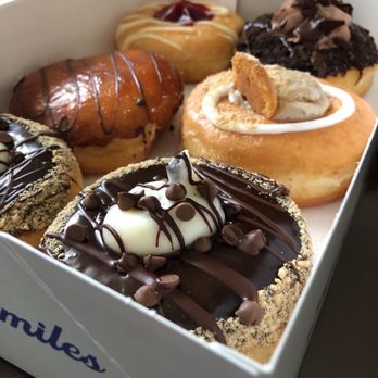 Mojo Donuts - From left to right Cannoli x2, Nutella Creme brûlée, guava and cheese, death by chocolate, and banana creme pie. - Donuts Near Me - Pembroke Pines, Florida