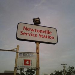 Newtonville Service Station - Sign out front