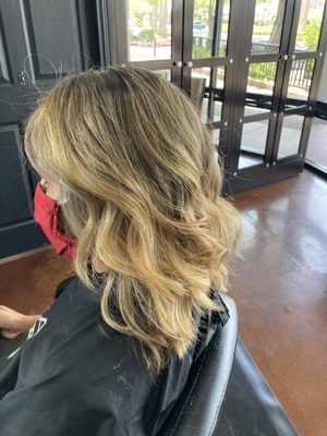 Color and cut - This model has naturally curly hair we balayage then cut and style Color and cut - This model has naturally curly hair we balayage then cut and style