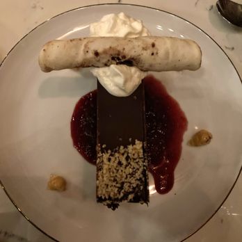 Baileys' Chocolate Bar - Hazlenut torte - decent presentation for an ok dessert. - Lounges Near Me - Saint Louis, Missouri Baileys' Chocolate Bar - Hazlenut torte - decent presentation for an ok dessert. - Lounges Near Me - Saint Louis, Missouri