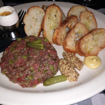 Bill's Restaurant - Steak Taratre with capers, gherkins, dijon, whole grain mustard, four minute egg - American Near Me - Bloomfield Hills, Michigan Bill's Restaurant - Steak Taratre with capers, gherkins, dijon, whole grain mustard, four minute egg - American Near Me - Bloomfield Hills, Michigan