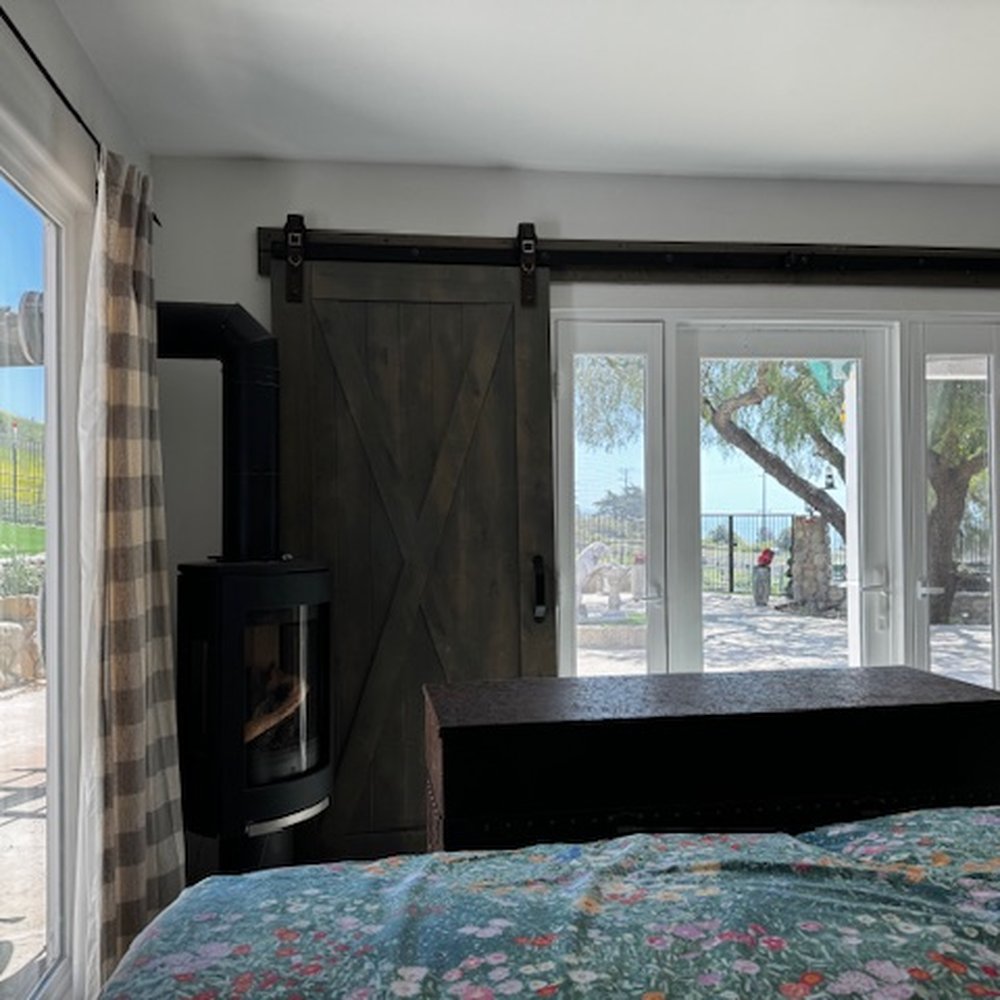JK Wood Construction - Added 16 sq feet to our master opening up amazing view with large entry, barn door window treatment and large picture window on left. - General Contractors Near Me - Goleta, California JK Wood Construction - Added 16 sq feet to our master opening up amazing view with large entry, barn door window treatment and large picture window on left. - General Contractors Near Me - Goleta, California