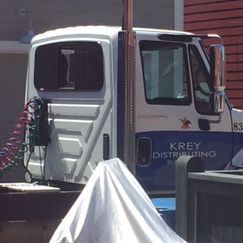Krey Distributing - a delivery truck parked in front of a building - Beer, Wine & Spirits Near Me - Saint Peters, Missouri Krey Distributing - a delivery truck parked in front of a building - Beer, Wine & Spirits Near Me - Saint Peters, Missouri