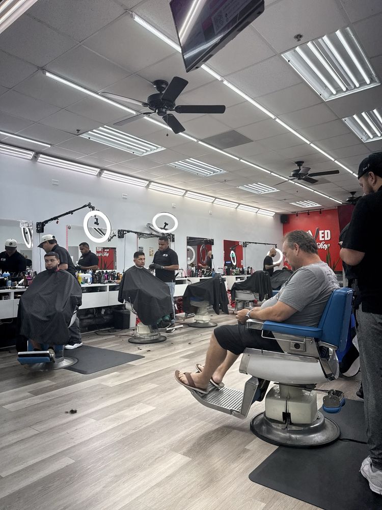 Shaved Barbershop Logo