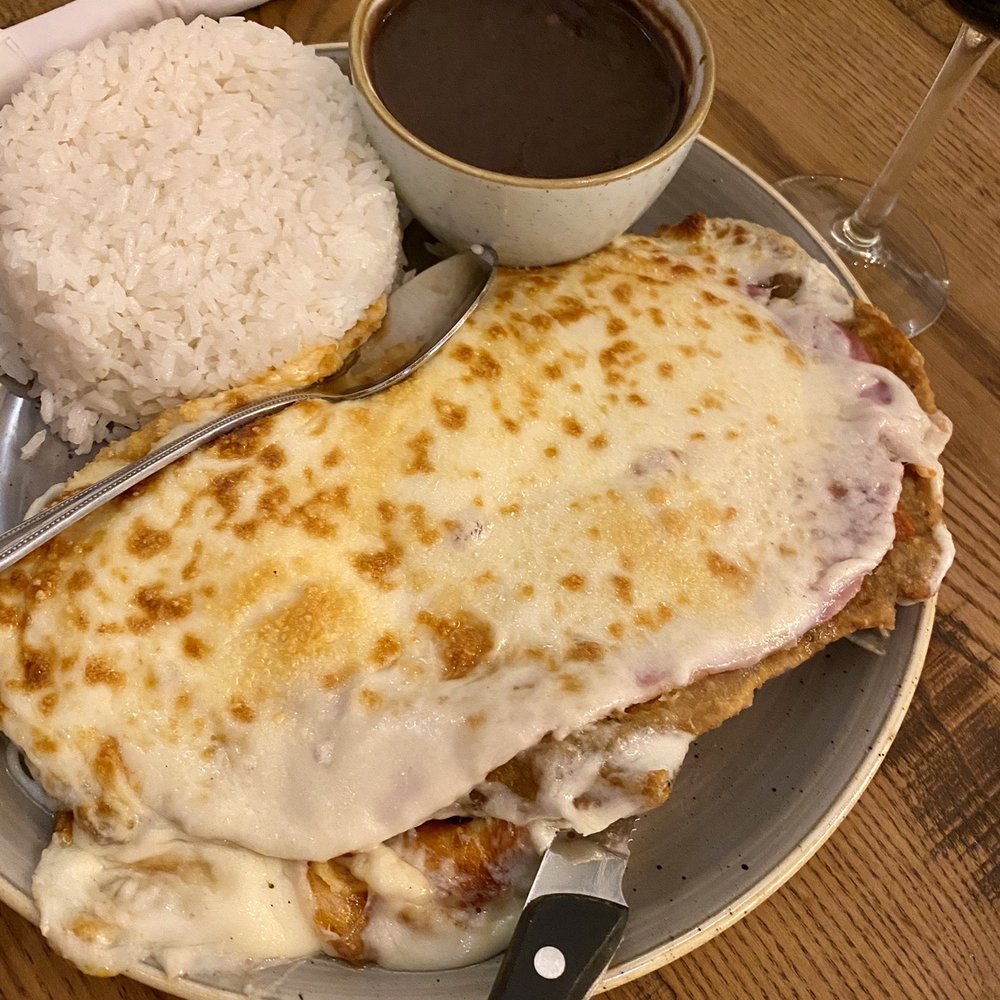 Islas Canarias Cafe - Steak Milanesa loaded with cheese. Yum! - Spanish Near Me - Miami, Florida Islas Canarias Cafe - Steak Milanesa loaded with cheese. Yum! - Spanish Near Me - Miami, Florida