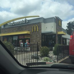 a view of a mcdonald's from a car window a view of a mcdonald's from a car window