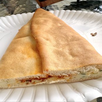 Araz Bakery - half of a spicy borek - Armenian Near Me - Fresno, California