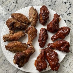 Puck’s Pub - Parmesan garlic and spicy bbq wings
