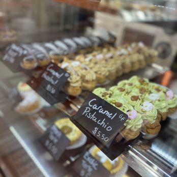 DOLCE & AMARO ARTISAN BAKERY - Caramel pistachio ecler - Bakeries Near Me - Greensboro, North Carolina DOLCE & AMARO ARTISAN BAKERY - Caramel pistachio ecler - Bakeries Near Me - Greensboro, North Carolina