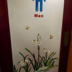 Toyami Steak House - Thematic bathroom door to match Ladies room