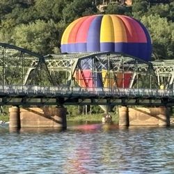 Hot air balloon touching St Croix River